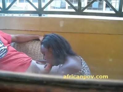 Rwandan cutie Leslie sucks dick on a sunny balcony
